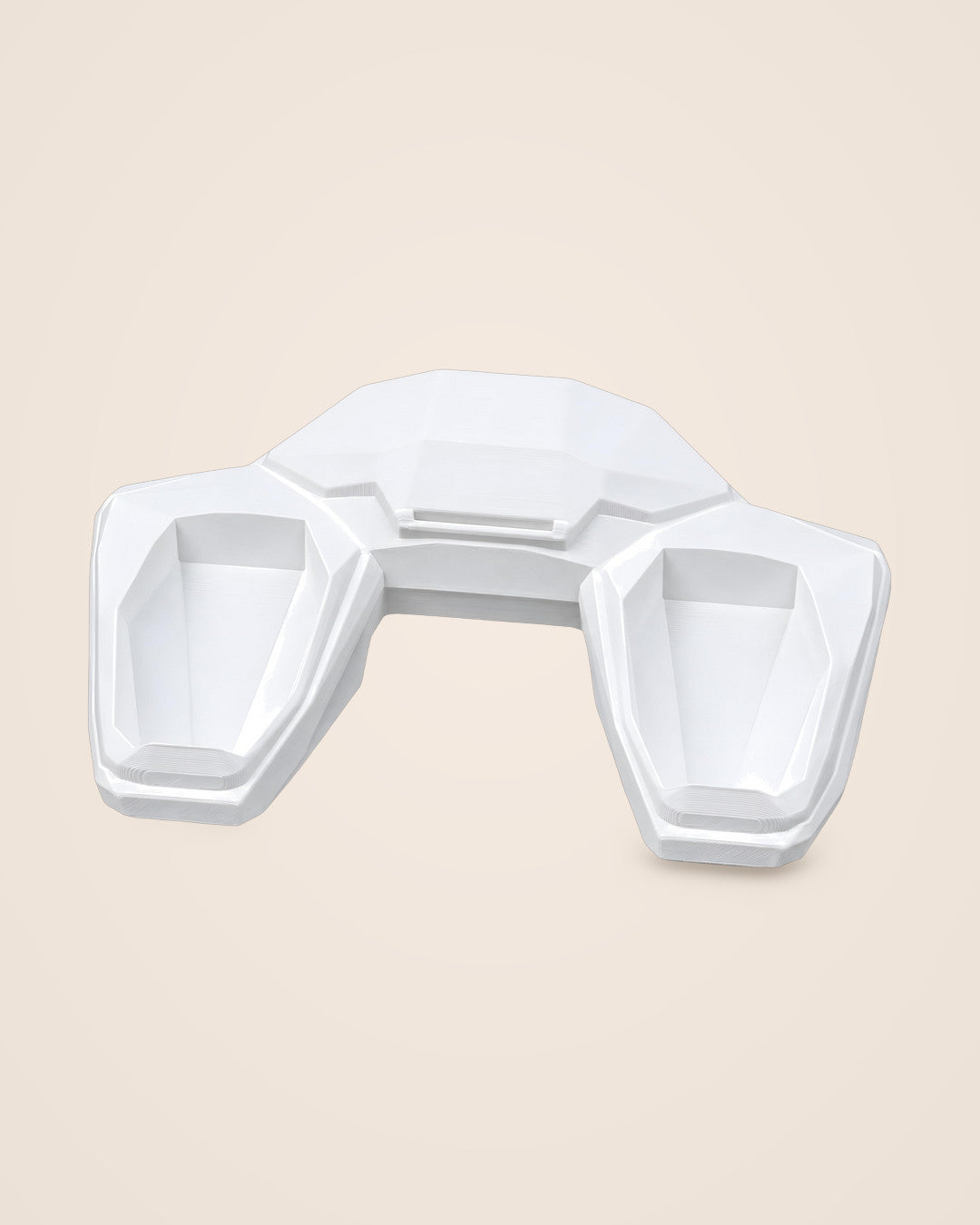Faceted Controller Stand: Angled sci-fi cradles that hold a controller within reach