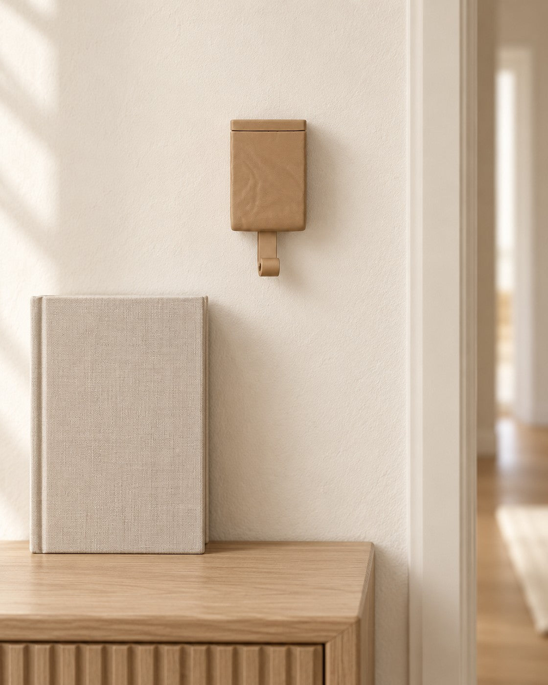 Peeking Cat Key Holder in a calm, softly lit interior, shown at true scale