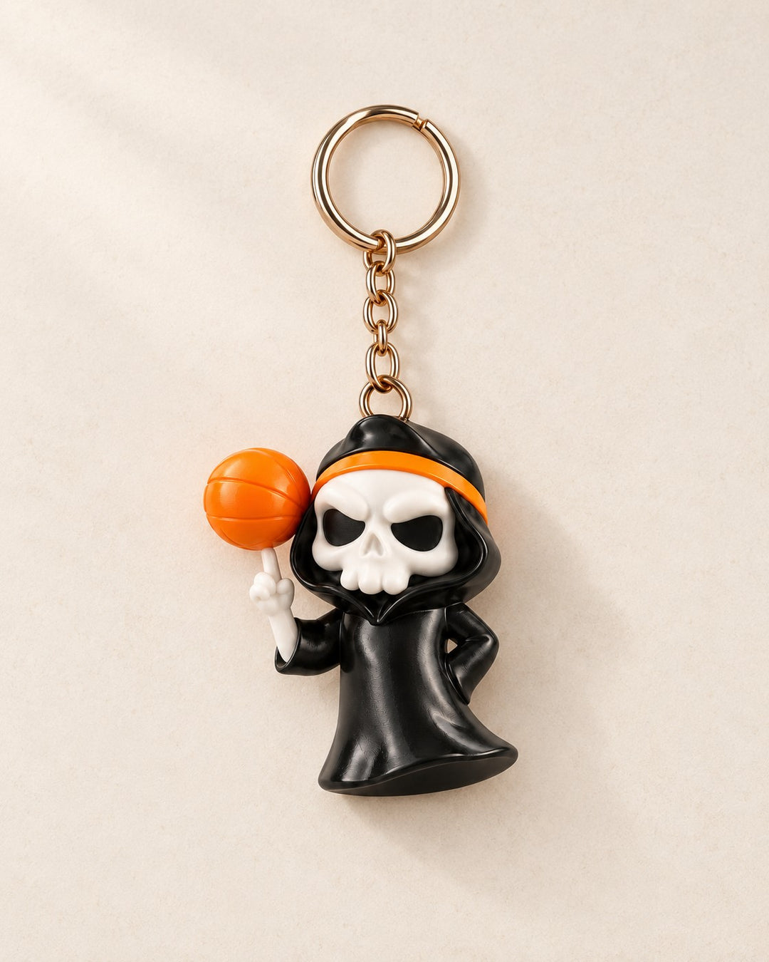 Slam Reaper Keyring: Hooded skeleton with an orange basketball, on a split ring and chain