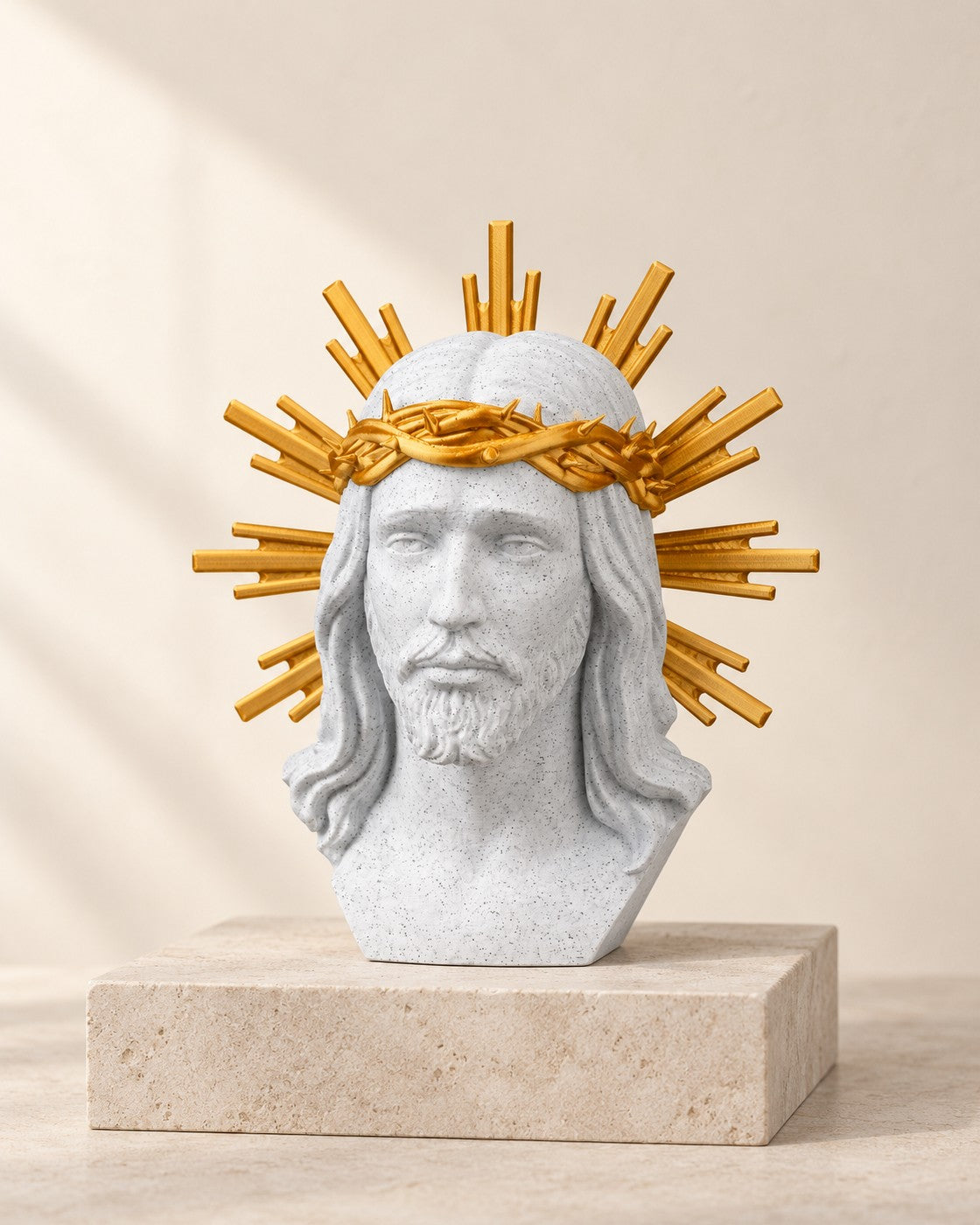 Sacred Bust with Gold Halo on a pale limestone plinth, soft studio light