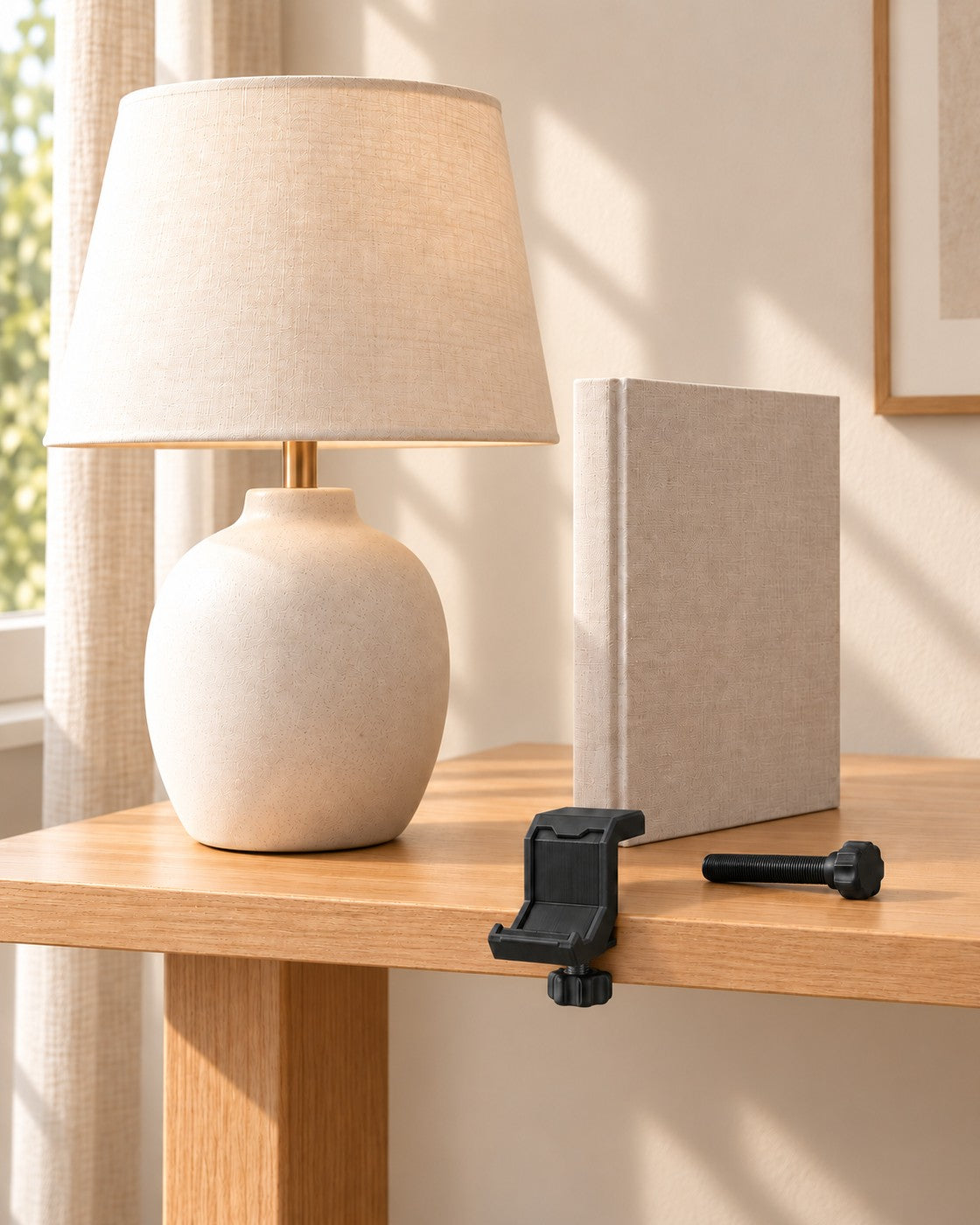 Under-Desk Headphone Clamp in a calm, softly lit interior, shown at true scale