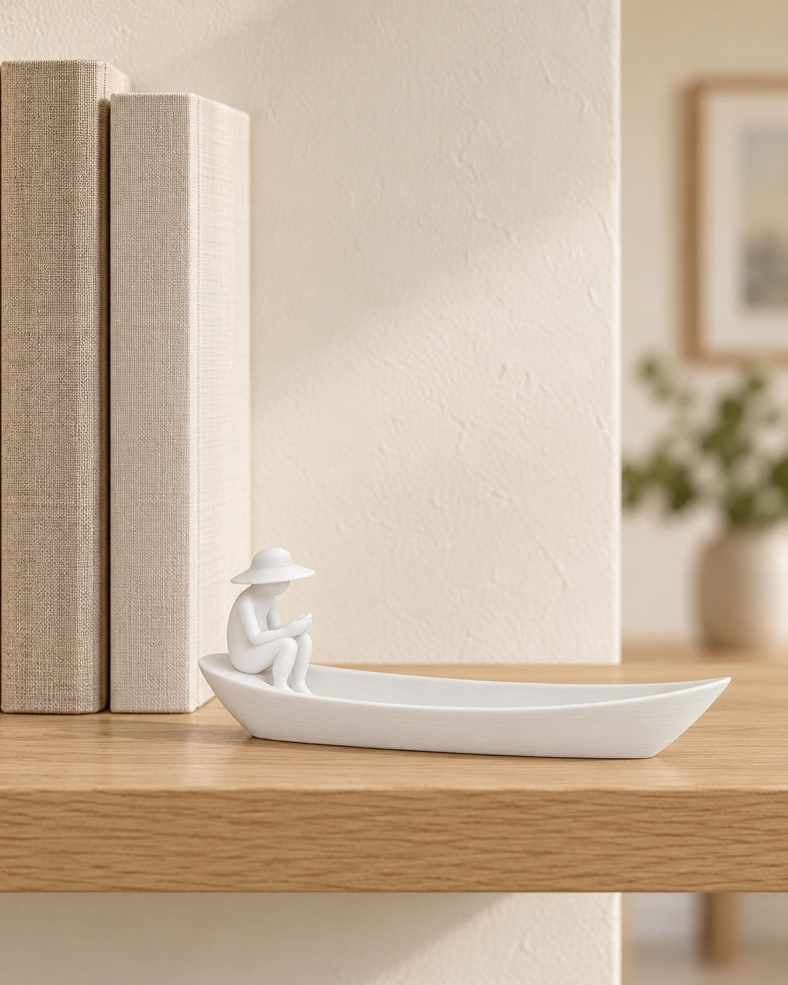 Fisherman Boat Incense Holder in a calm, softly lit interior, shown at true scale