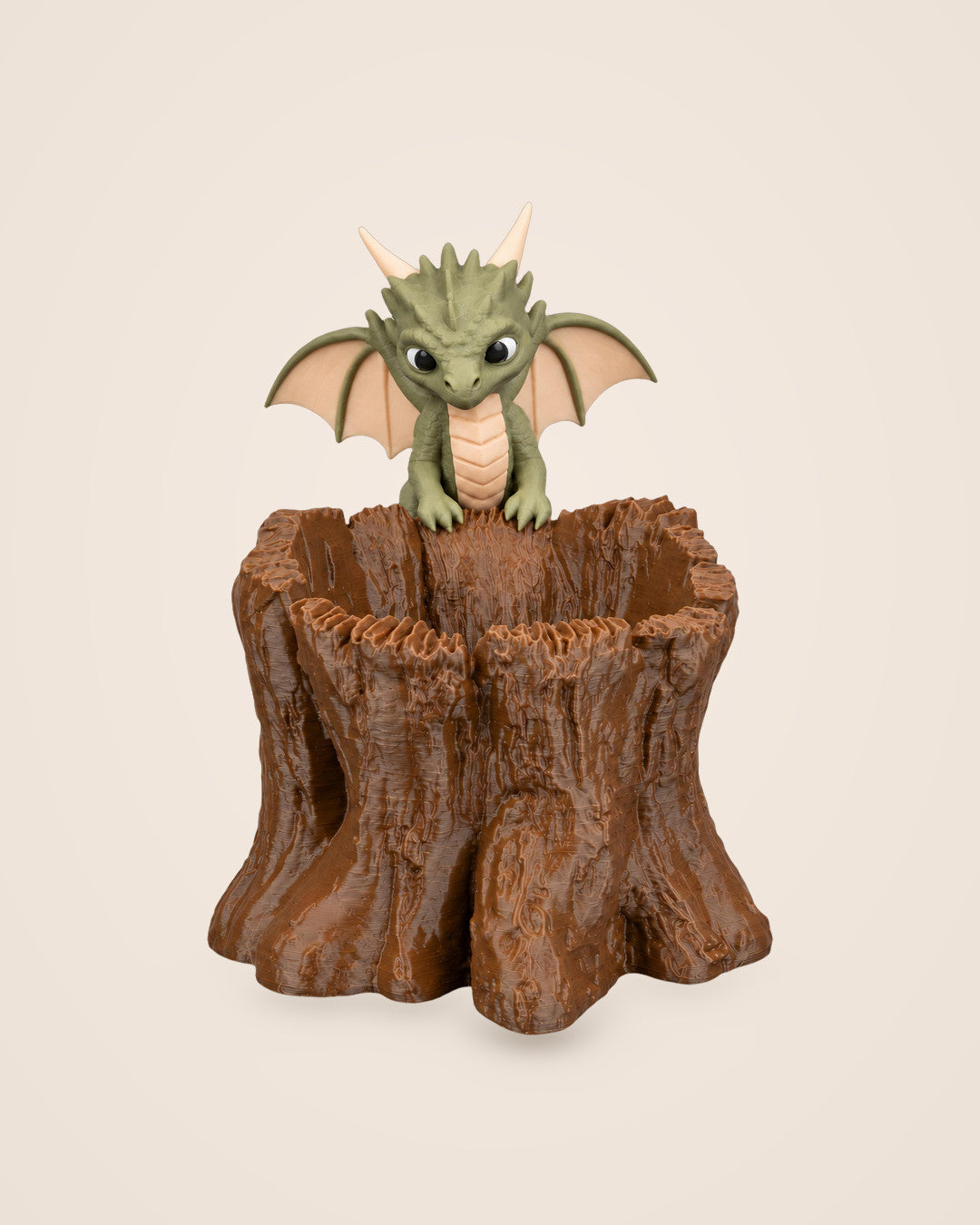 Baby Dragon Stump Planter: Bark-textured planter with a baby dragon keeping watch on the rim
