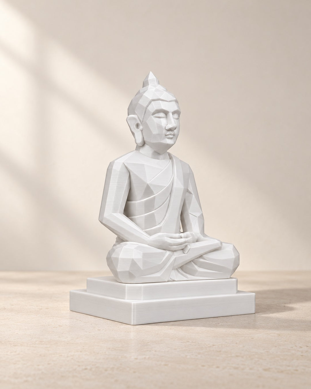 Small Meditating Buddha: Faceted matte white figure on a stepped plinth, 10.6 cm high