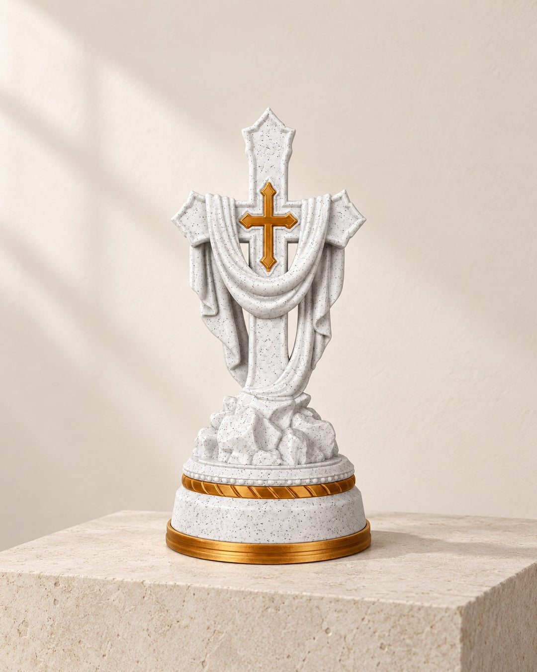 Illuminated Draped Cross: Compact white and gold statue with a softly lit base