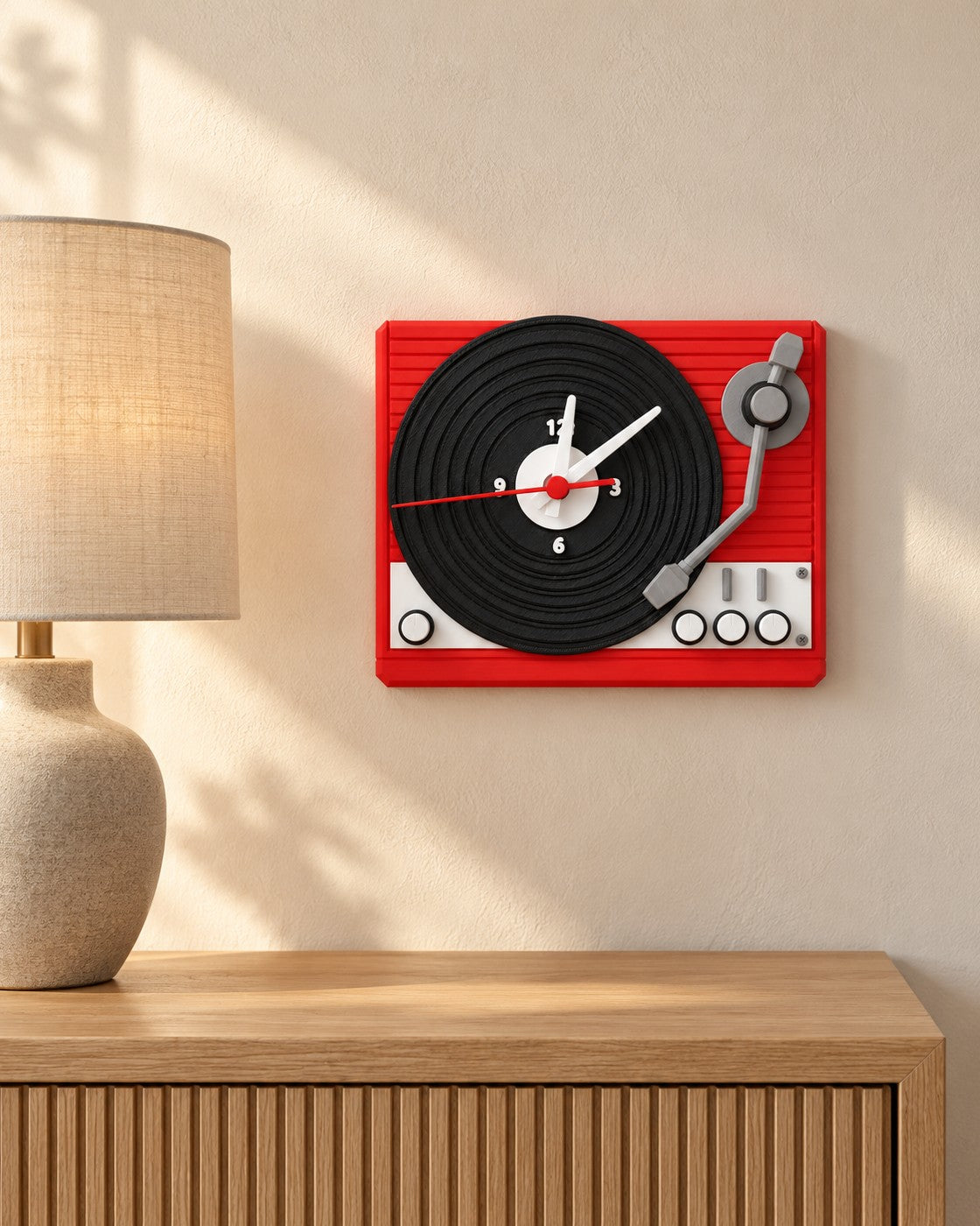 Turntable Wall Clock in a calm, softly lit interior, shown at true scale