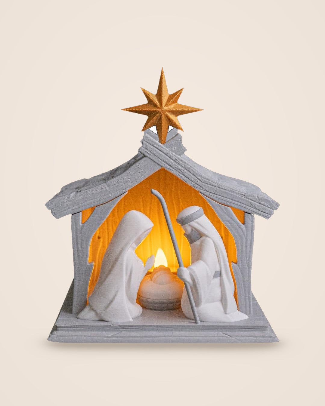 Illuminated Nativity Scene: Holy Family beneath a grey stable and gold-coloured star, lit by an LED candle
