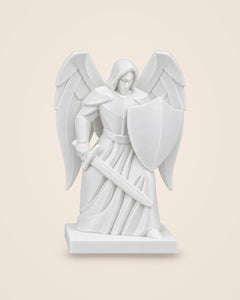 Archangel Michael Statue: Kneeling guardian figure with sword and shield, in matte white