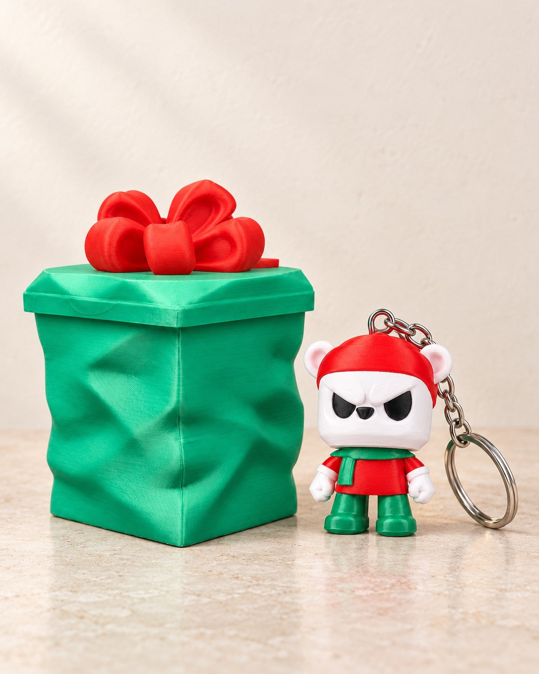 Grumpy Bear Gift Keyring: Grumpy festive bear charm with a lidded gift container