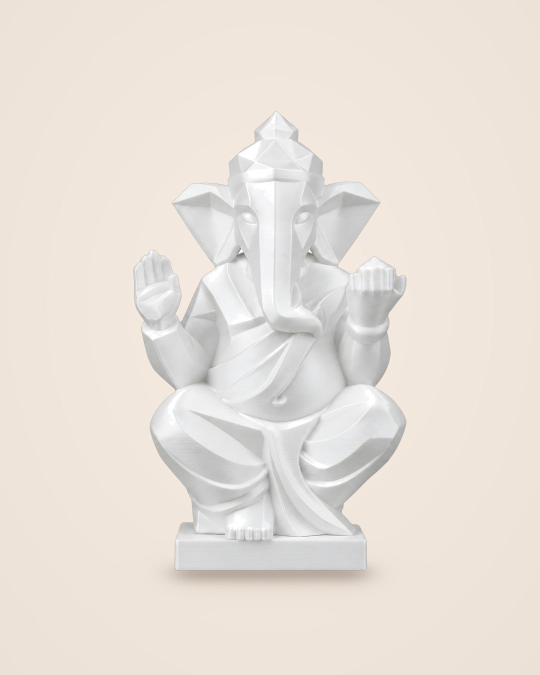 Faceted Ganesha Statue: A seated Ganesha in faceted matte white, on its own plinth