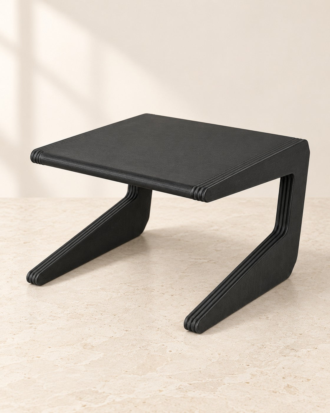 Narrow Shelf Riser on a pale limestone plinth, soft studio light