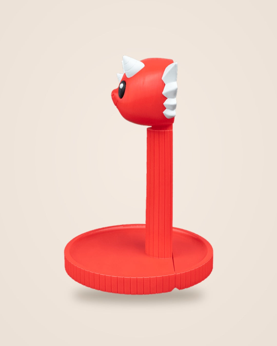 Red dragon headphone stand with white horns, side profile showing the slim stem and round tray base