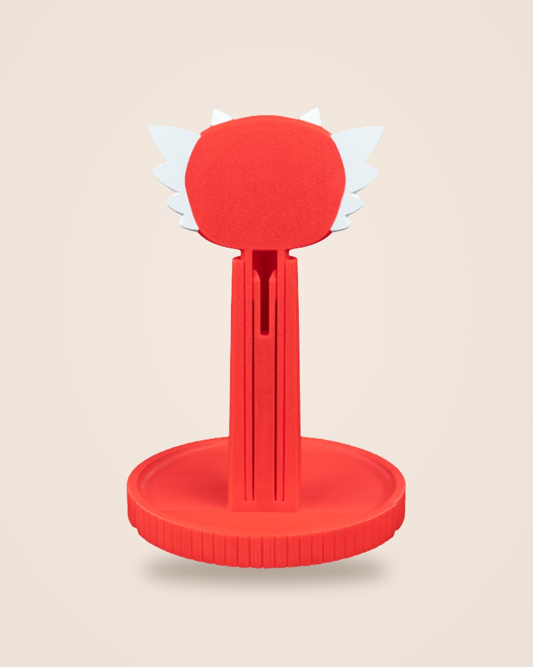 Red dragon headphone stand with white wing-shaped side horns, back view showing the flat back of the head and the slotted stem