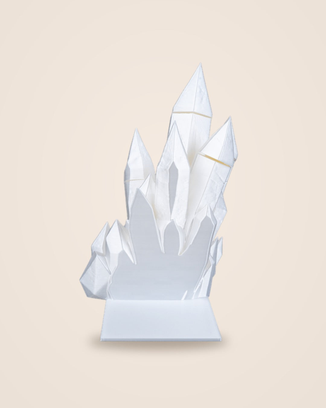 White crystal cluster bookend, rear view showing the flat base plate, on a soft cream background