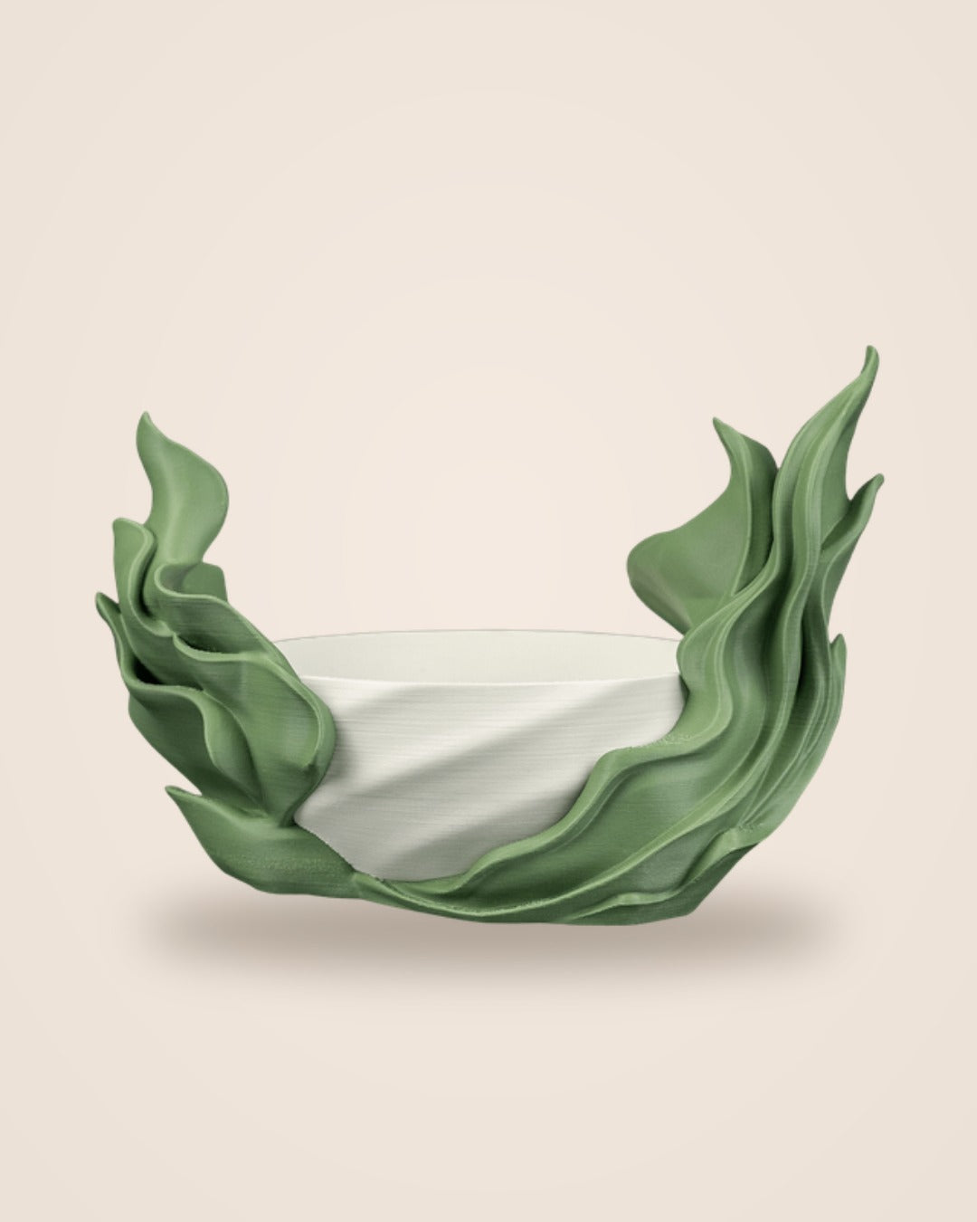 Seaweed Flow self-watering planter, white bowl wrapped in green kelp-like fronds, front view on a cream background