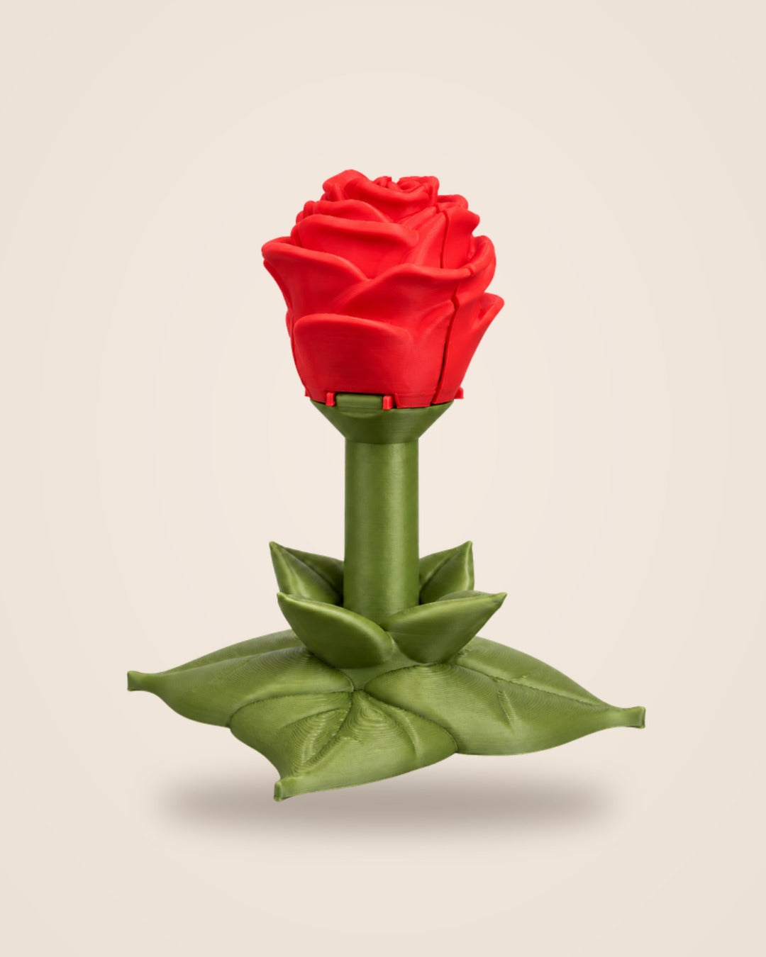 Sweet Rose ring box: a red rose on an olive-green stem standing on a leaf base